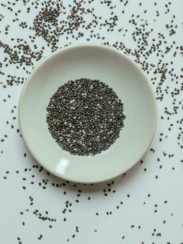 Black Seeds on White Ceramic Plate