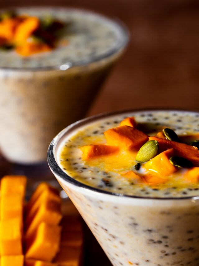 a close up of two glasses of food on a table