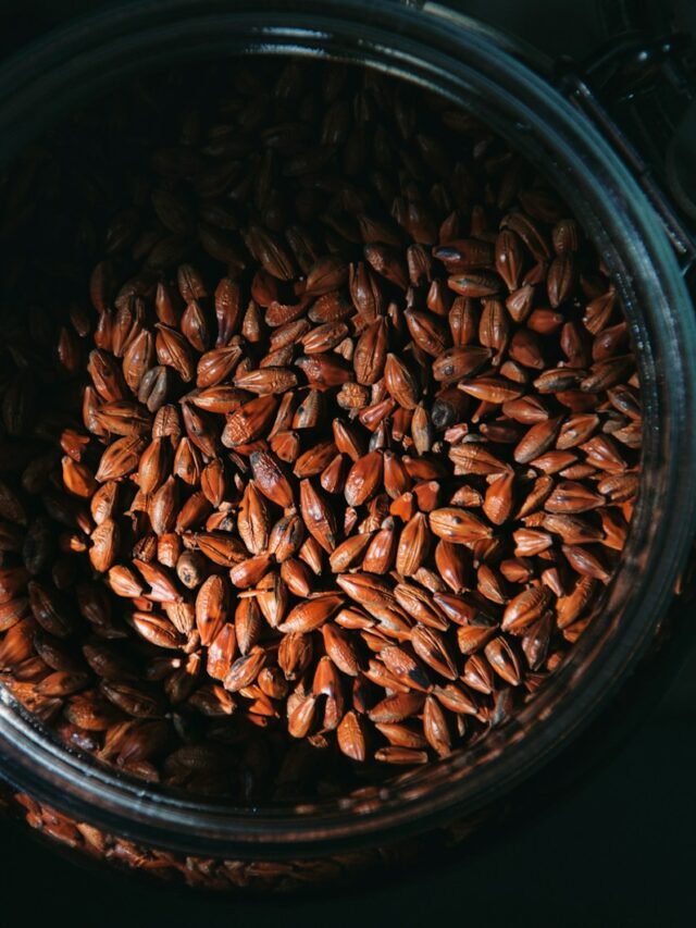 a glass jar filled with lots of seeds