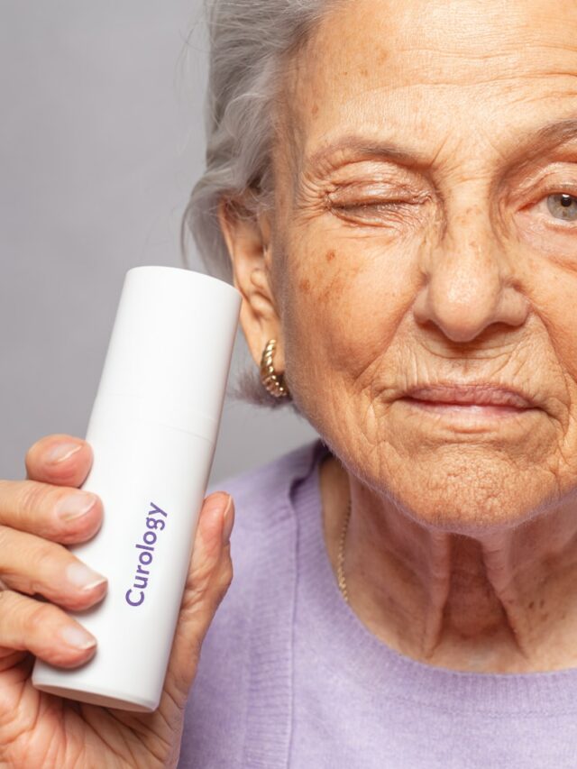 woman holding Curology bottle