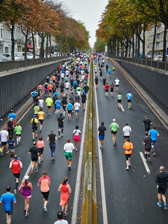 people running on road during daytime