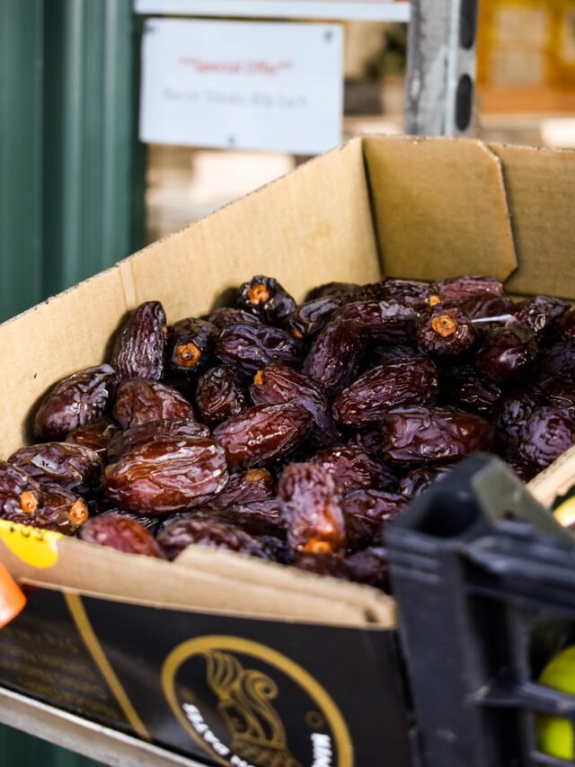 a cardboard box filled with raisins sitting on top of a table