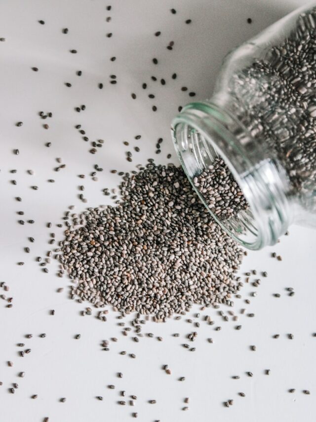 black beads in clear glass jar