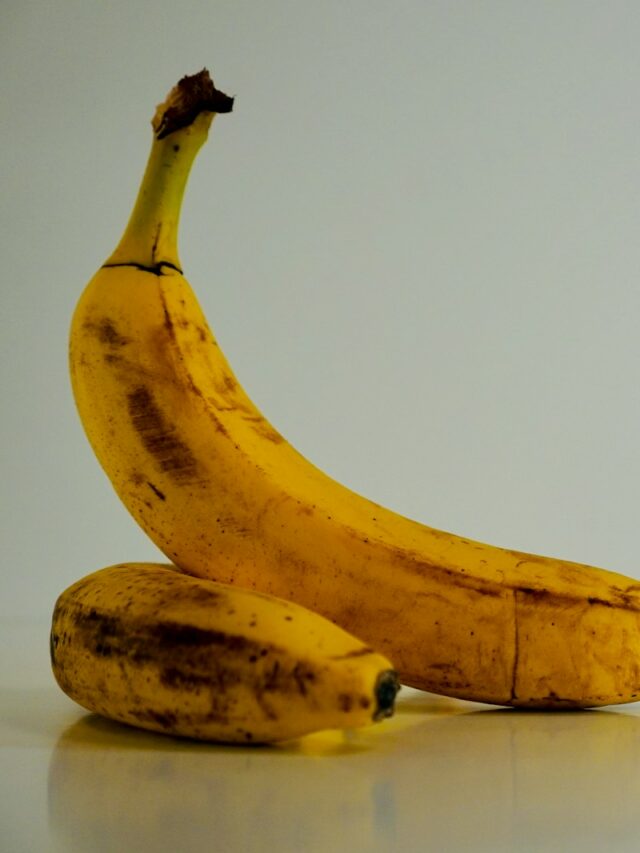 a couple of bananas sitting on top of a table