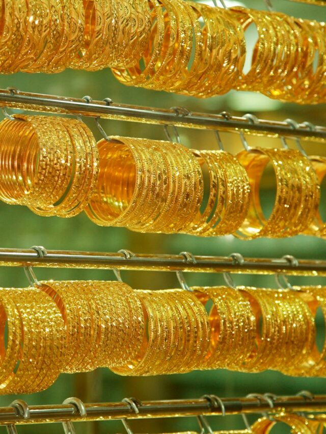 yellow and orange fruit on stainless steel rack